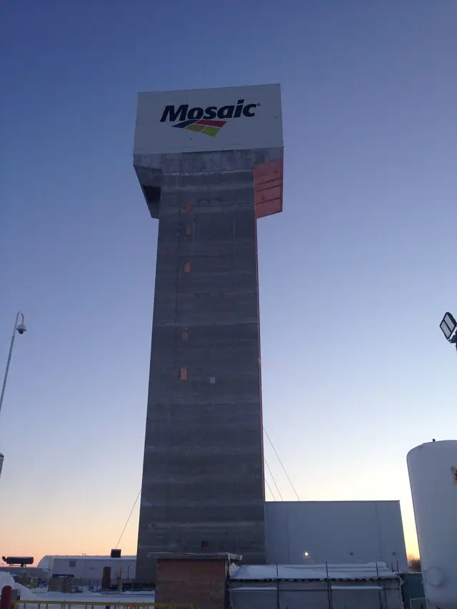 Mosaic K3 mine headframe at dusk